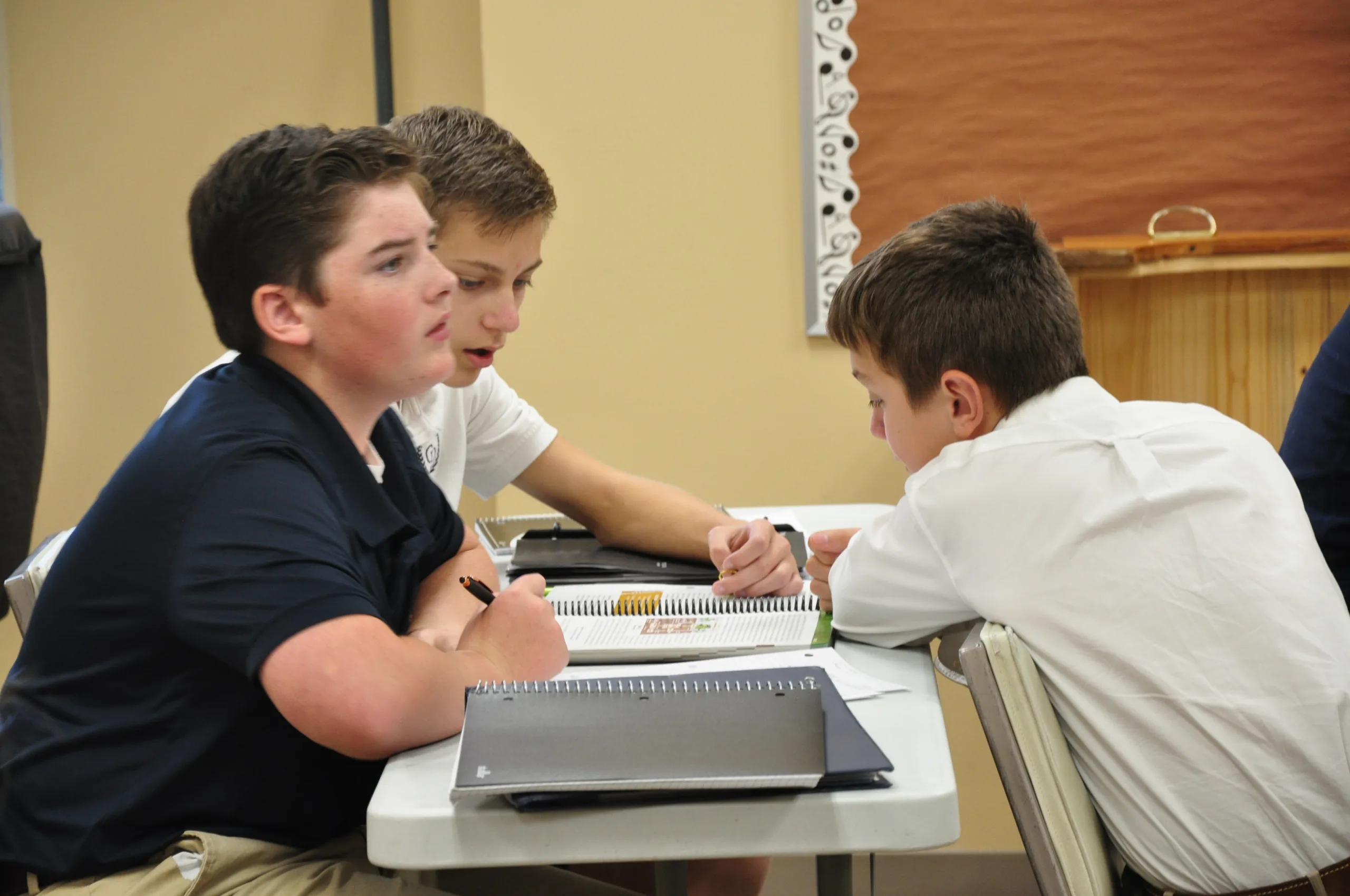 Classroom setting at Coram Deo Classical School emphasizing a Christ-centered, classical curriculum.