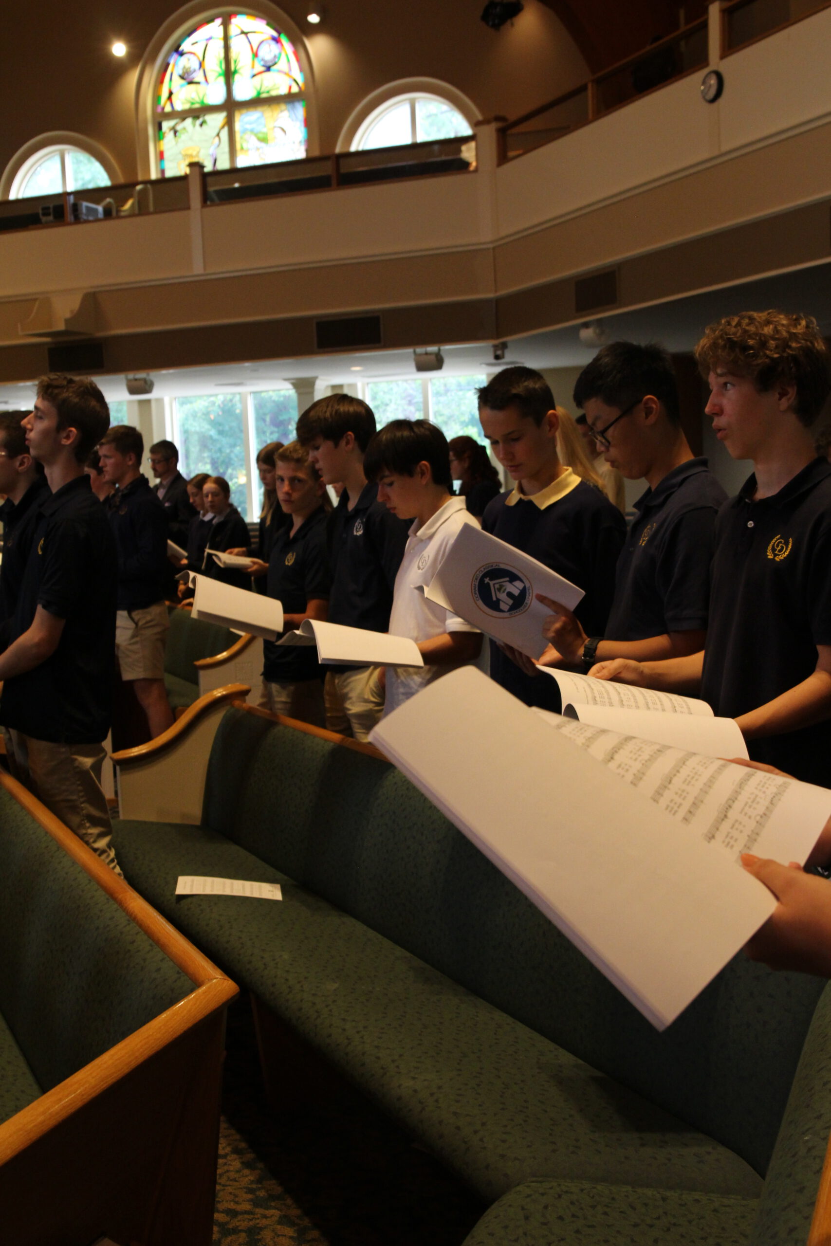 Students singing Christian hymns at Coram Deo Classical School.