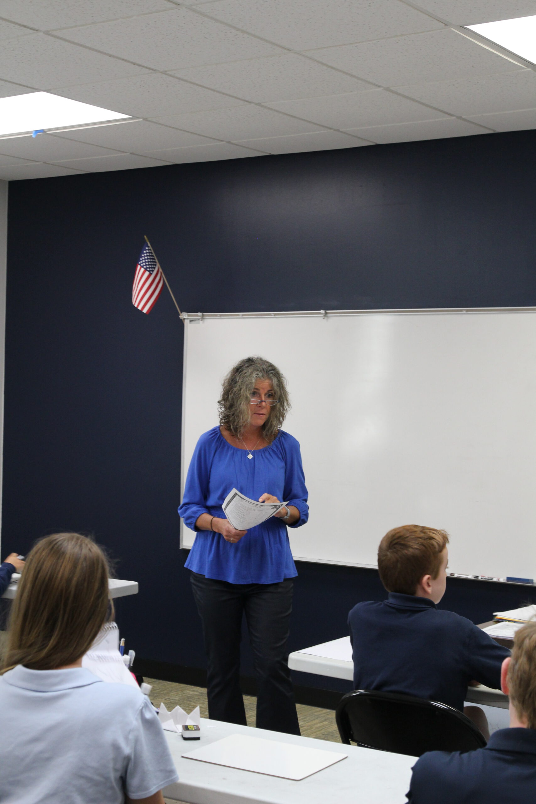 Students and teachers engaging in Christian classical discussion in the classroom.